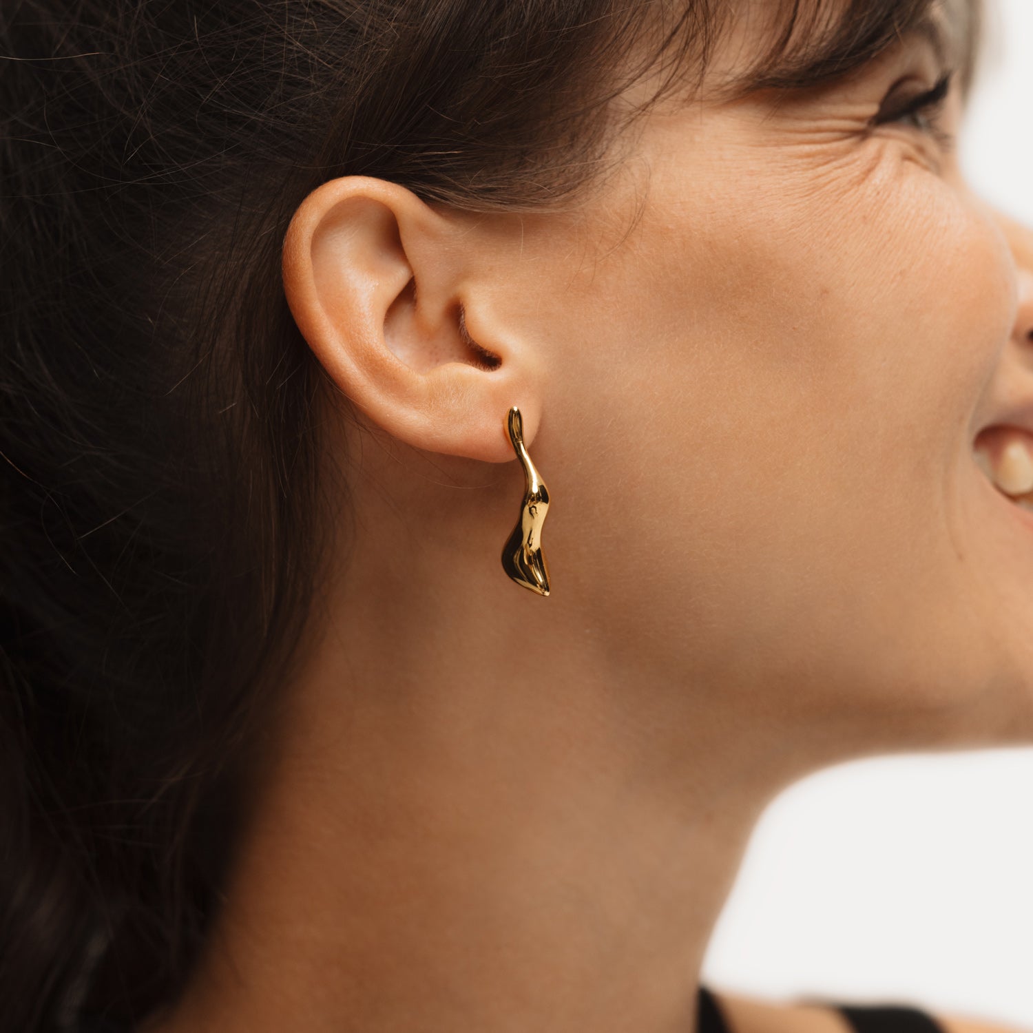 Poise Molten Drop Earrings, recycled 18k Gold Vermeil, shown on model - VEYIA Berlin